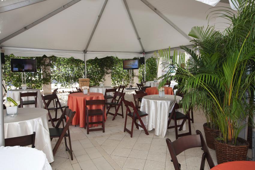 ARELLANO CONSTRUCTION COURTYARD WITH TENT AND TABLES